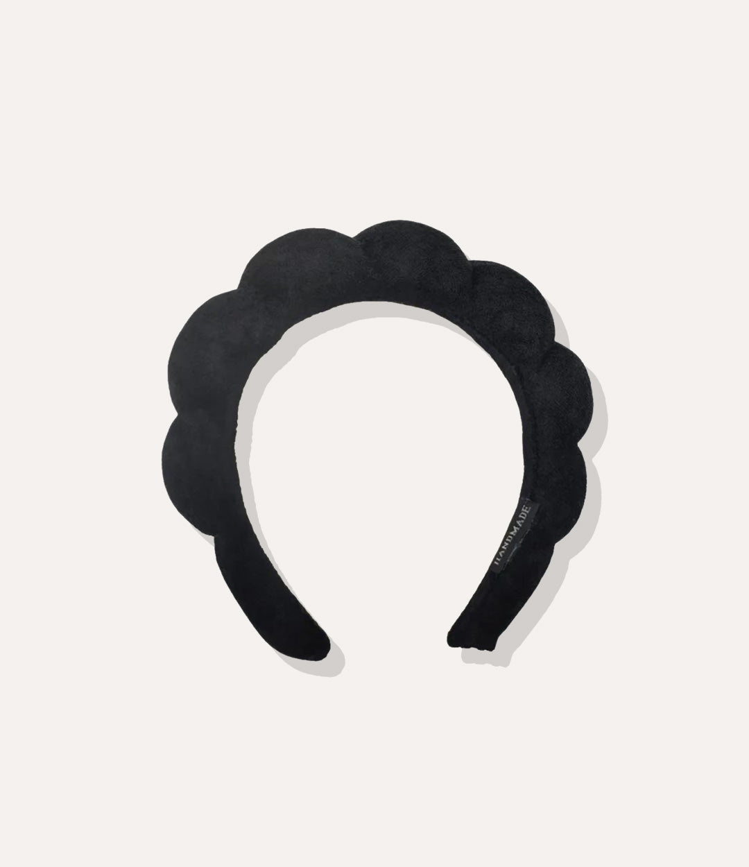 Puffy Towel Headband in black, featuring a thick sponge-like design and soft terry cloth texture isolated on white.