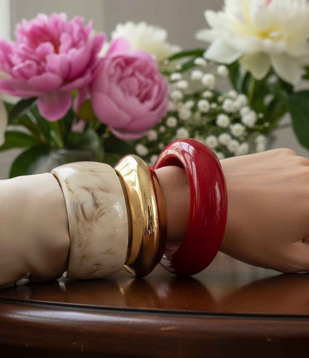 Resin Bangle Trio styled as a bold stack showcasing mixed colours and shapes.