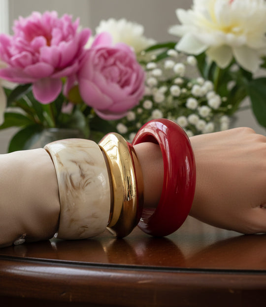 Resin Bangle Trio styled as a bold stack showcasing mixed colours and shapes.