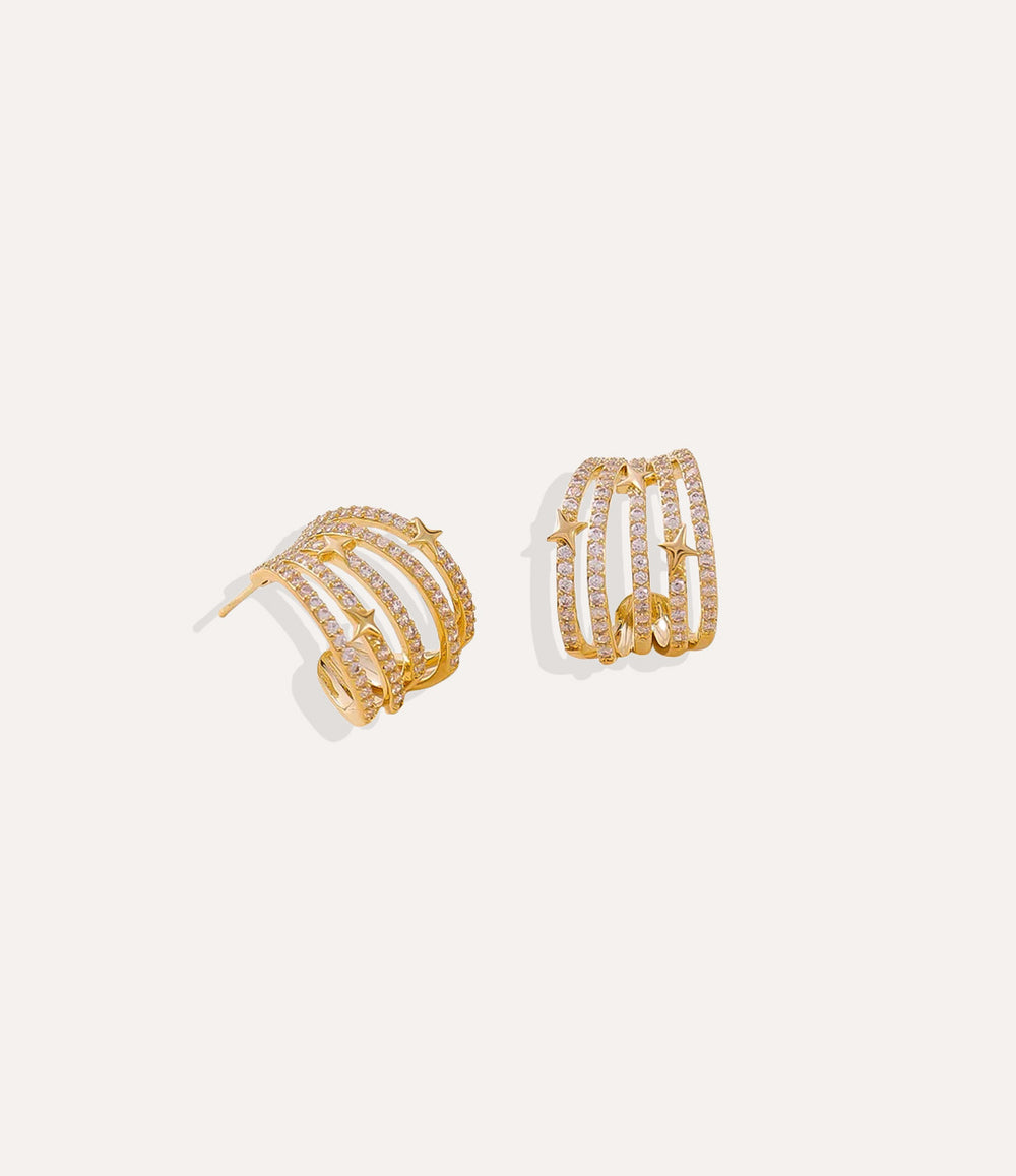 Gold Shooting Star Diamond Studs featuring tiny star accents and diamond embellishments.