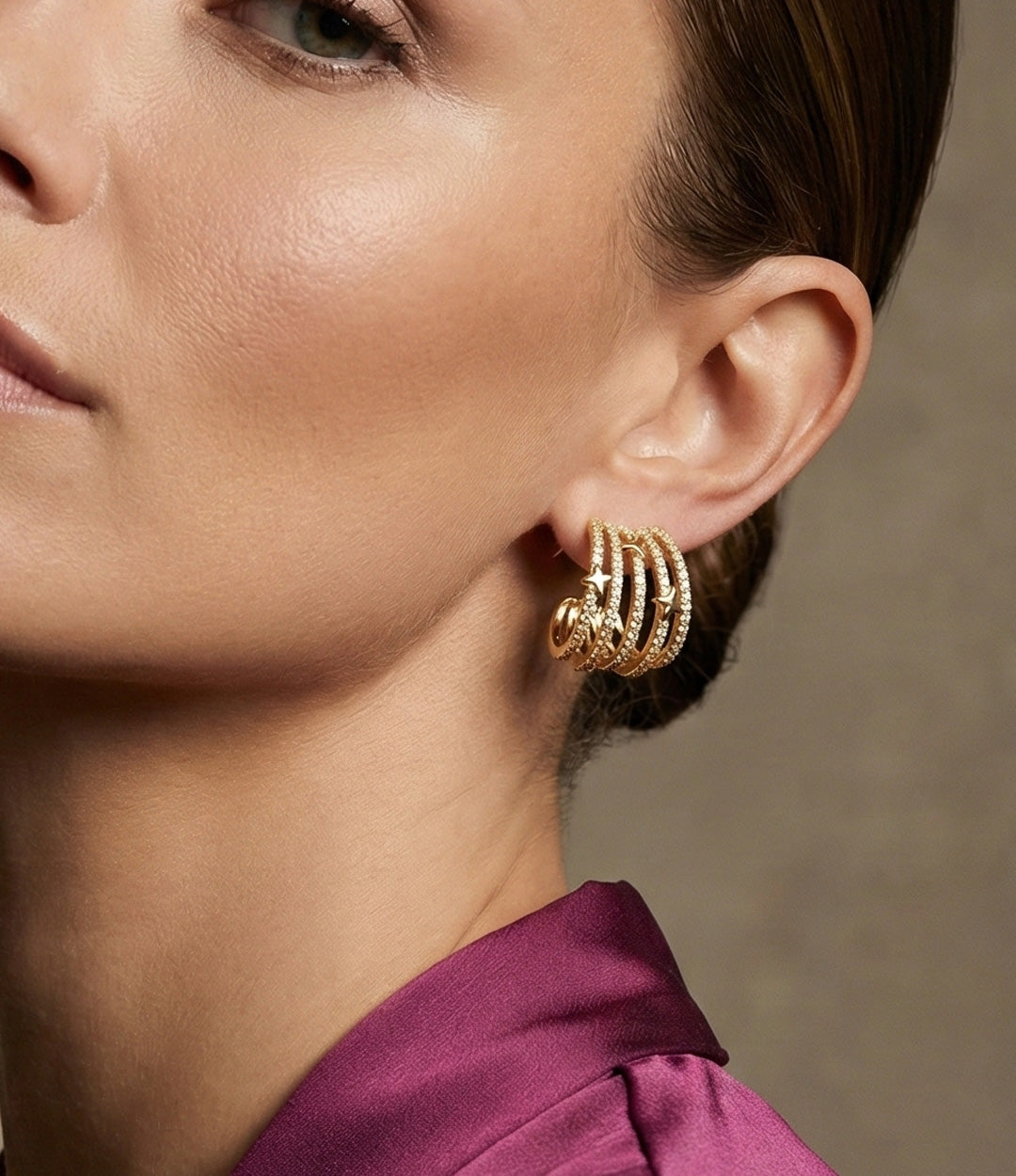 Model wearing Shooting Star Diamond Studs with delicate star accents and subtle diamond sparkle