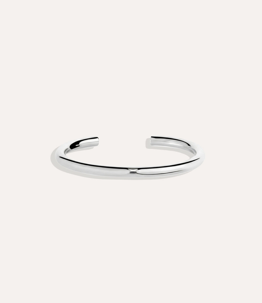 Skinny Essential Cuff in silver displayed on a neutral background with a sleek minimalist design.