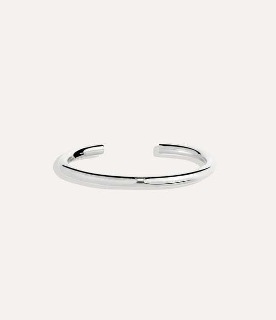 Skinny Essential Cuff in silver displayed on a neutral background with a sleek minimalist design.