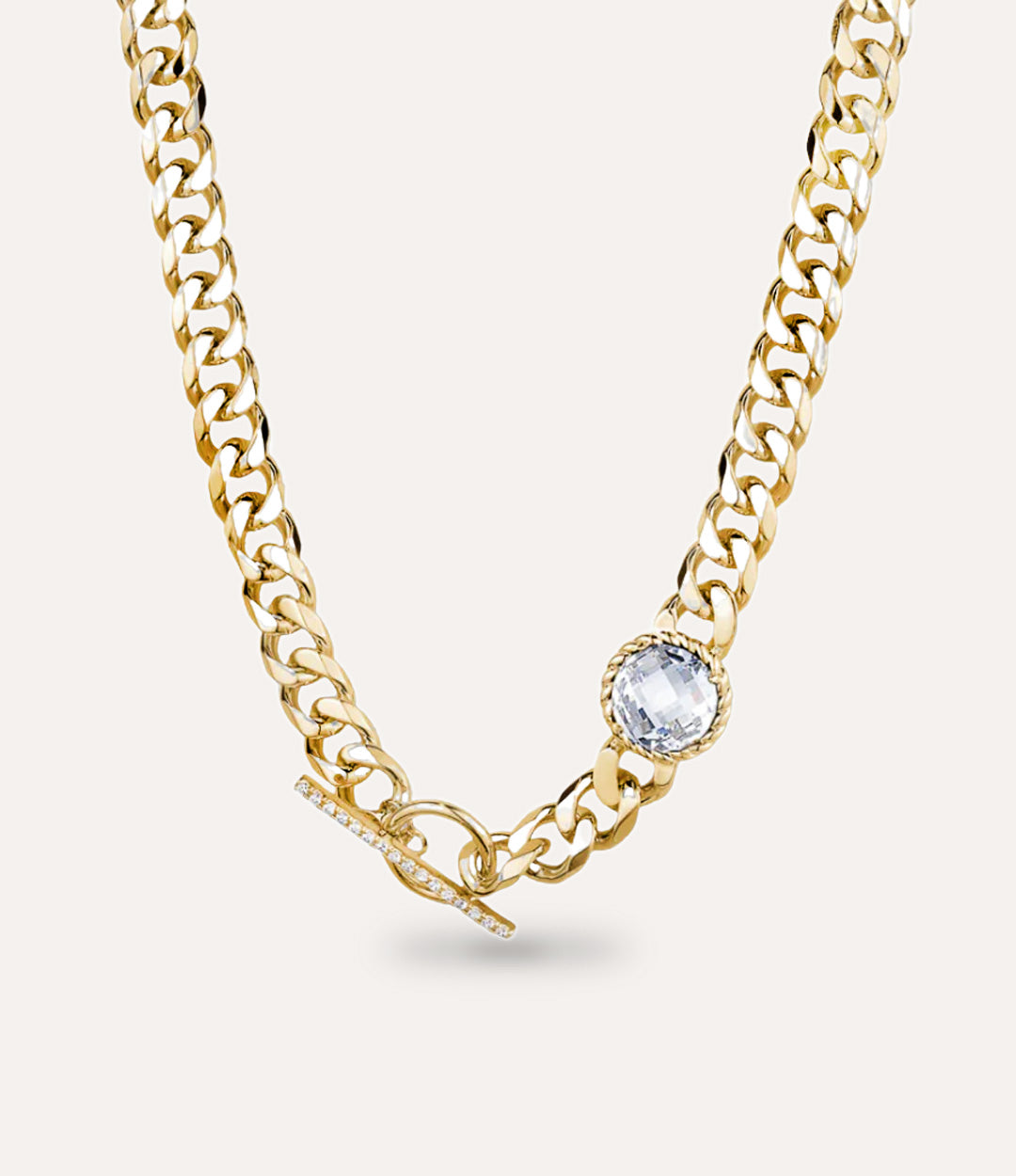 Gold chain necklace with a central white diamond on a white background