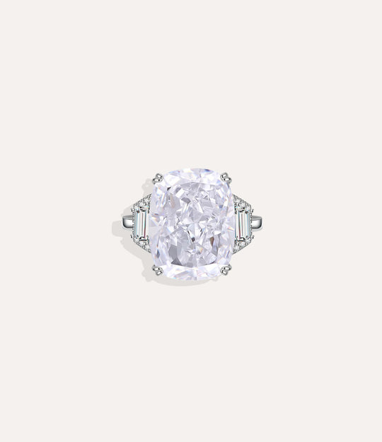 Silver Solitaire Squoval Ring, highlighting the cool silver tone, sparkling central stone, and open-back adjustable design.