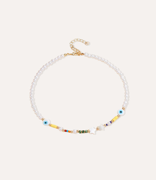 Star Protection Necklace featuring pearls, colourful beads, star charms, and evil-eye accents on a gold clasp.