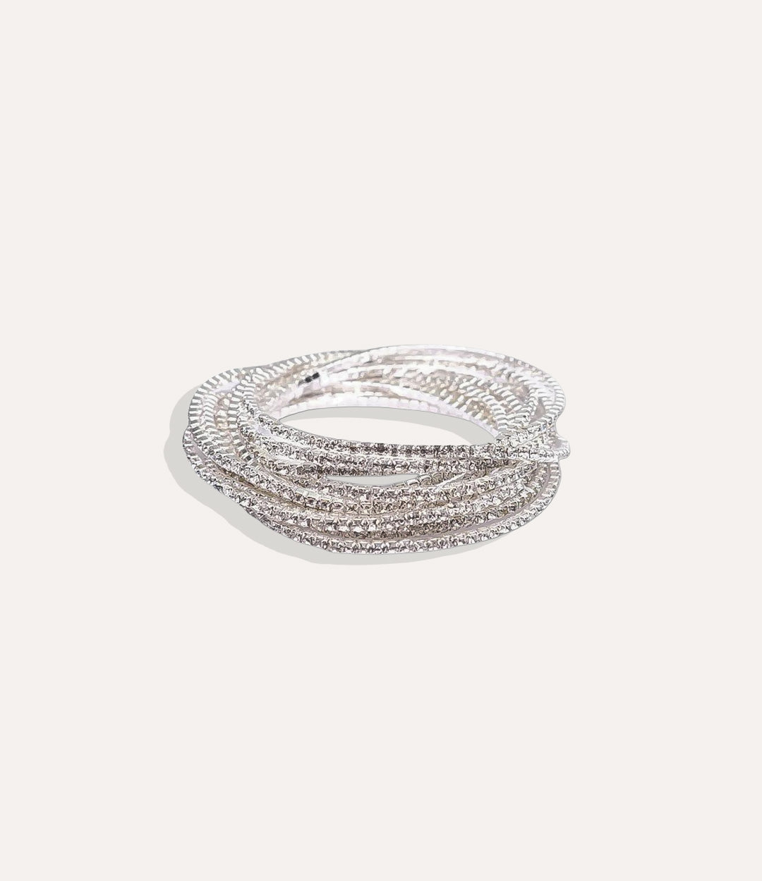 Stretch Tennis Bracelet in silver stainless steel featuring bright clear stones and a flexible stretch band in a clean product photo.