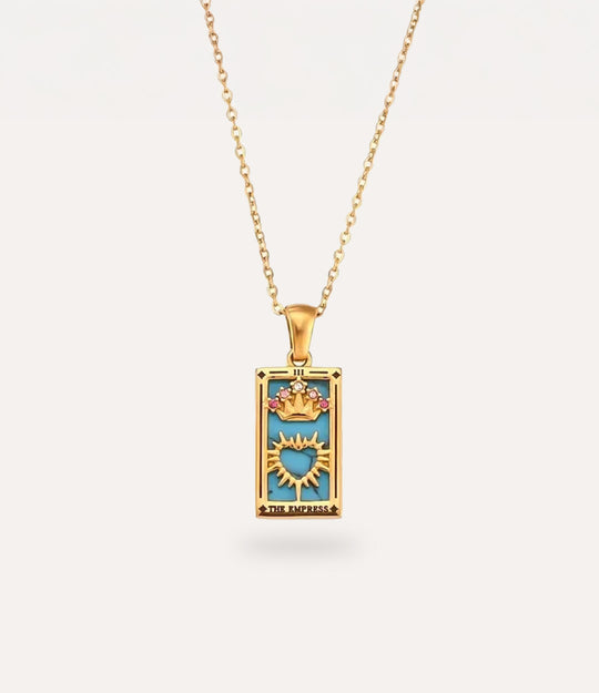 The empress - gold tarot card pendant necklace with link chain displayed on a neutral background.