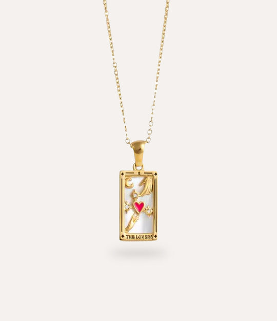 The lovers - gold tarot card pendant necklace with link chain displayed on a neutral background.