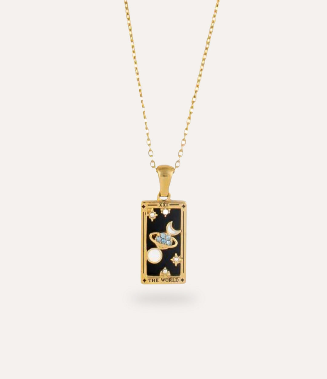The world - gold tarot card pendant necklace with link chain displayed on a neutral background.