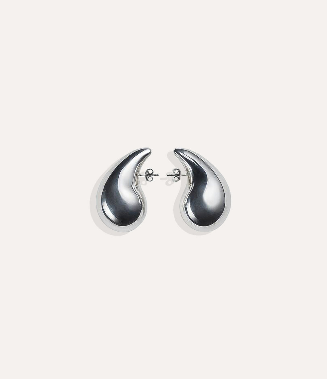 Product shot of the Tear Drop Stud in silver colour showing the cool sterling silver tone and modern puffy design on a white background.