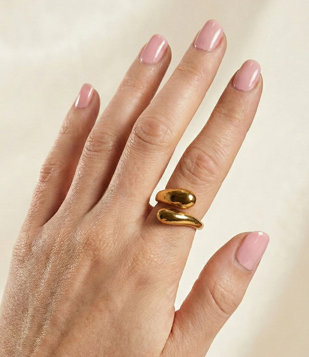 Model wearing a gold twist ring