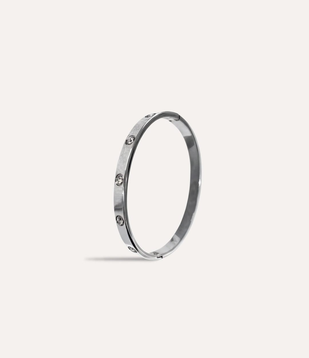 The Carter Bangle in silver finish displayed on a neutral background.