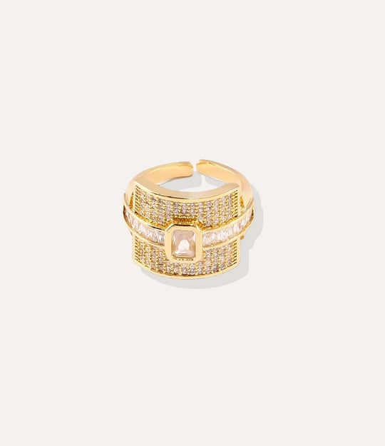 The Empress Ring in gold finish, featuring a glamorous design with diamond accents, isolated on a white background.