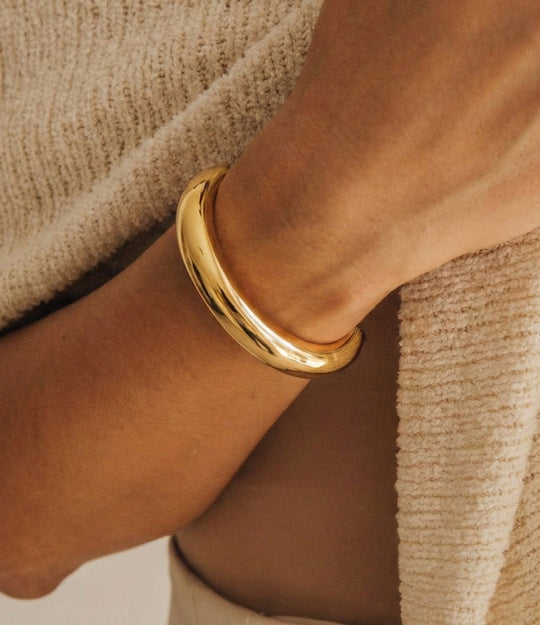 Model wearing The Essential Half Cuff in solo styling for a modern, minimal look.