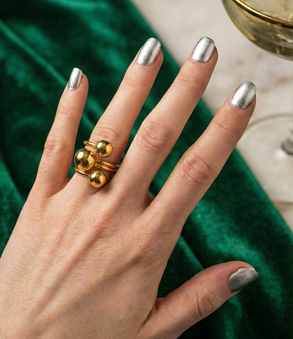 Model wearing gold ring 