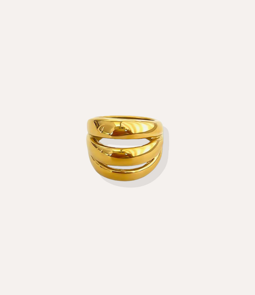Triple Stack Ring in 18k gold plated finish, featuring three fused slender bands made of durable stainless steel, isolated on a white background.