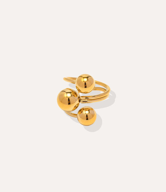 Triple Threat Ring in 14k gold plated finish, featuring a sculptural spiral wrap-around design isolated on a white background.
