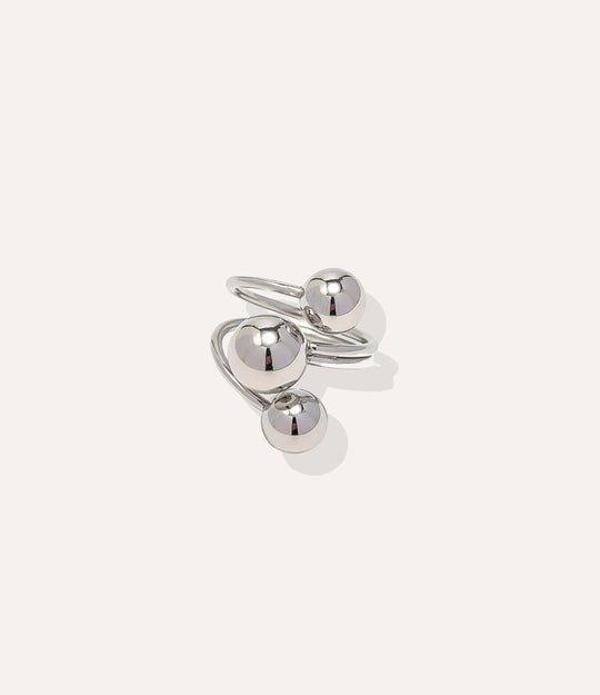 Sterling Silver Triple Threat Ring, highlighting the cool polished tone, fluid wrap shape, and waterproof construction.