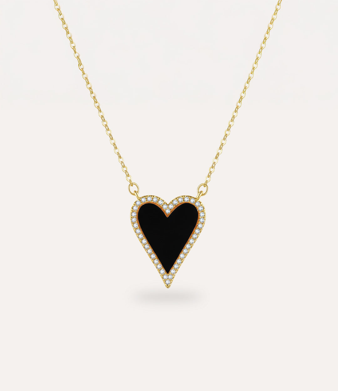 Necklace with a black heart pendant on a white background