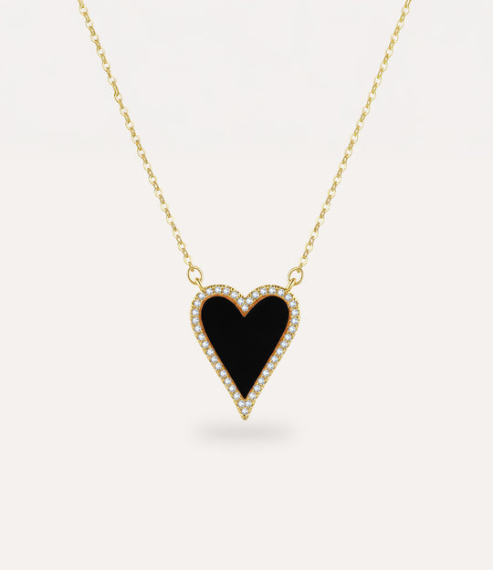 Necklace with a black heart pendant on a white background