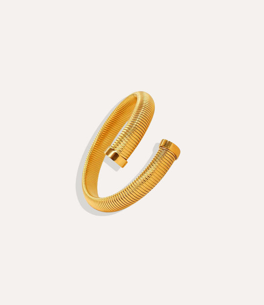18k gold-plated 12mm Twisted Snake Bangle displayed on a neutral background, showing its twisted textured design