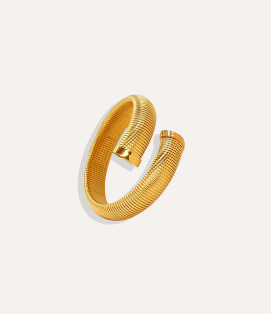 18k gold-plated 16mm Twisted Snake Bangle displayed on a neutral background, showing its twisted textured design