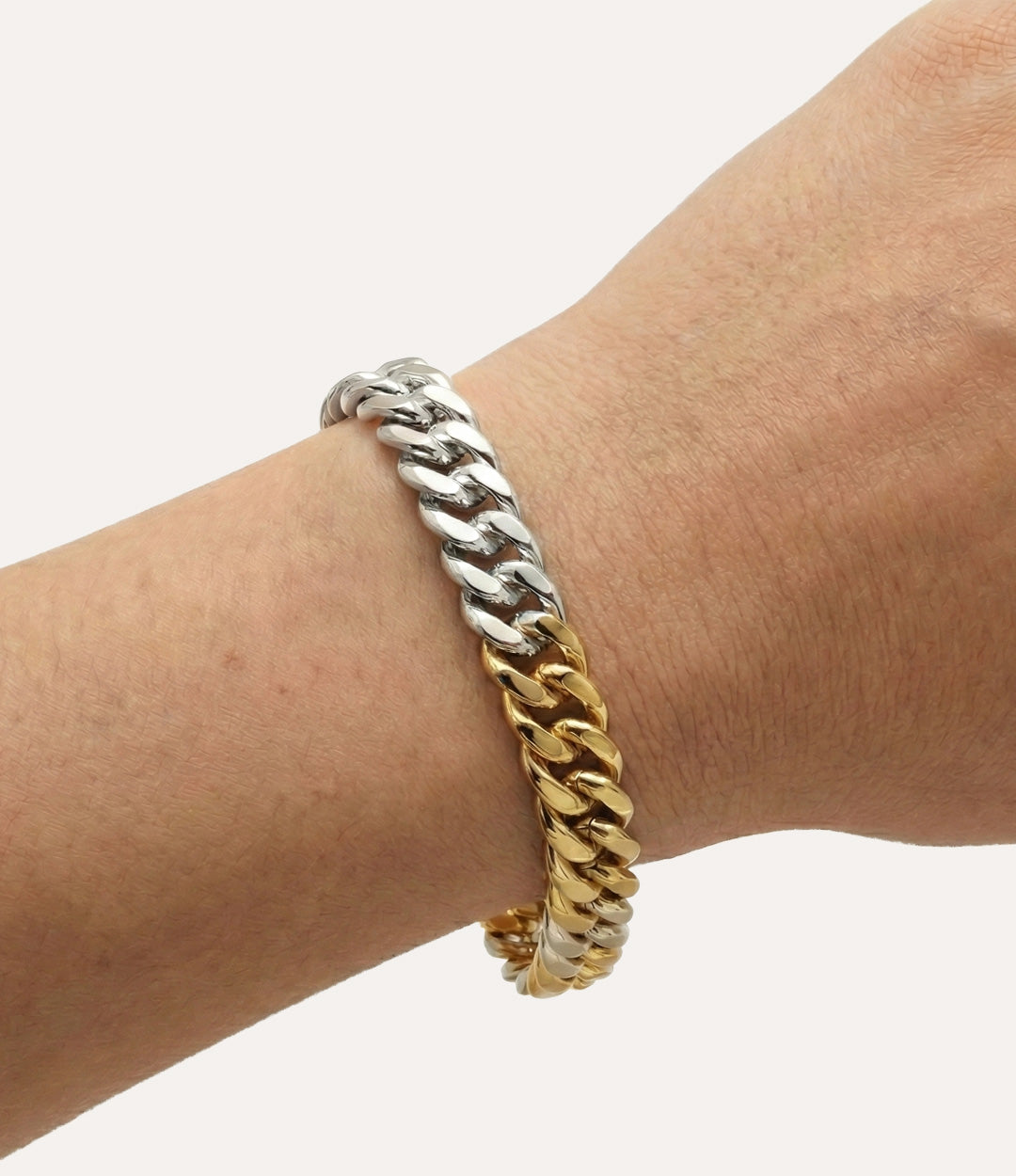 Model wearing the Two Tone Chain Bracelet on a plain background.