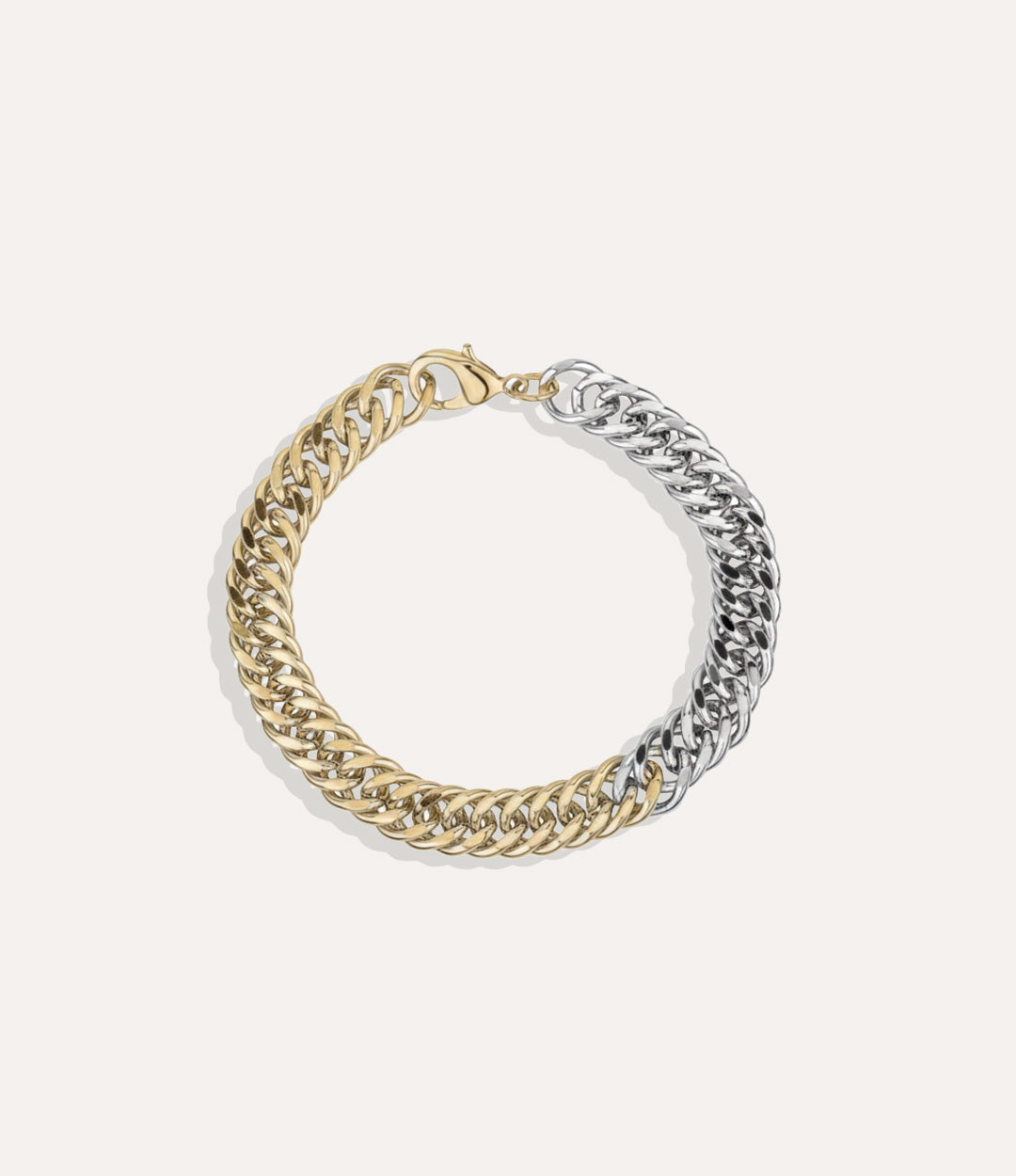 Two Tone Chain Bracelet made of brass, featuring mixed gold and silver links displayed on a neutral background.
