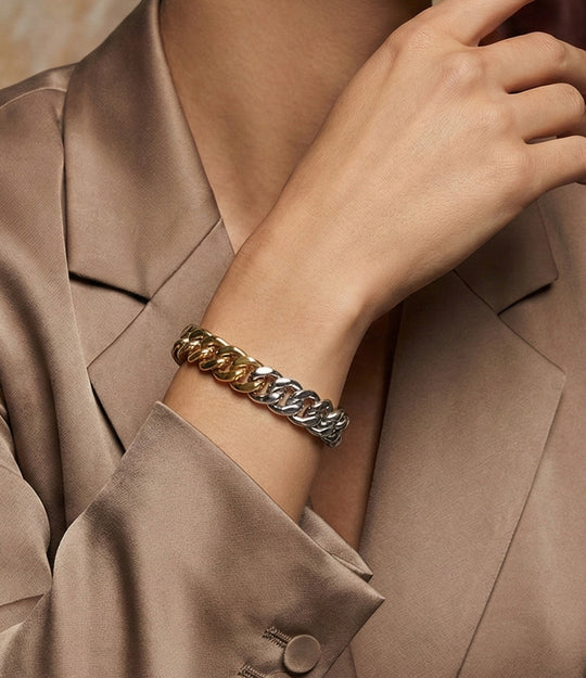 Model wearing the Two Tone Chain Bracelet with an elegant look.