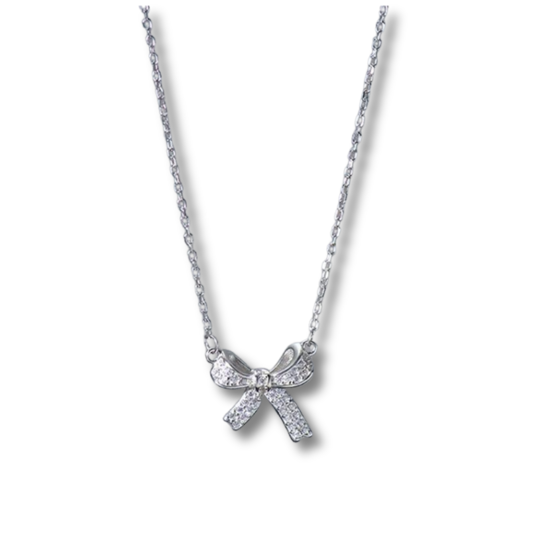 silver sparkly bow necklace