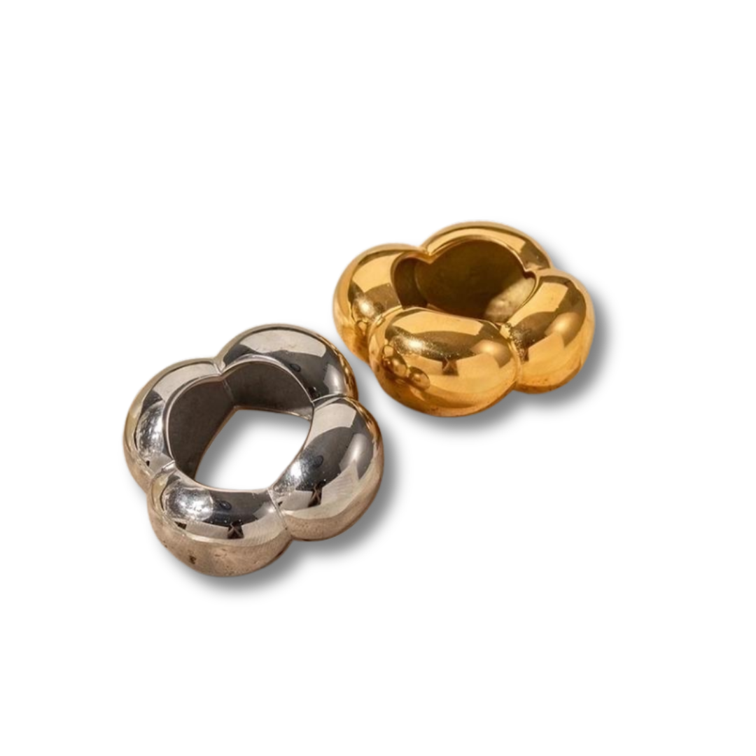 Gold and silver rings with bubbly design
