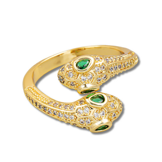 Gold snake ring with jewelled features