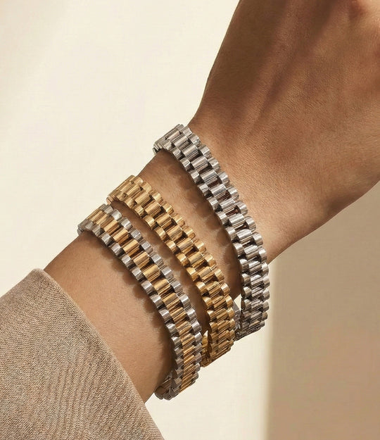 Model wearing the unisex Watch Band Bracelet, showcasing its bold chain-link design and modern, watch-inspired style.