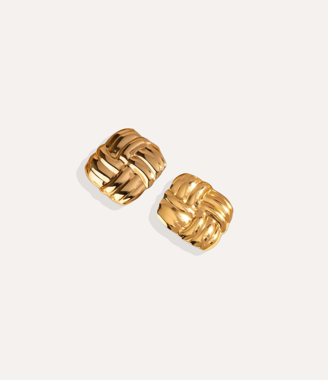Product shot of the Woven Stud in 18k gold plating displaying the interlaced gold pattern and warm metallic finish on a white background.