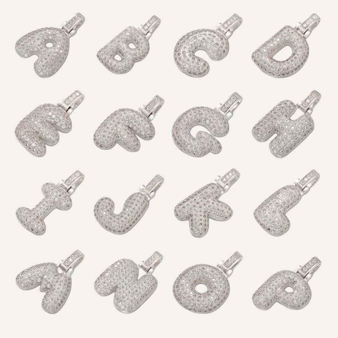 silver necklace with bubble letter charm