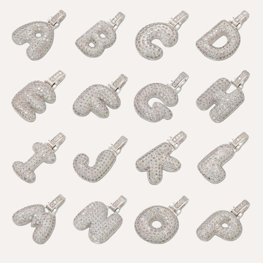 silver necklace with bubble letter charm